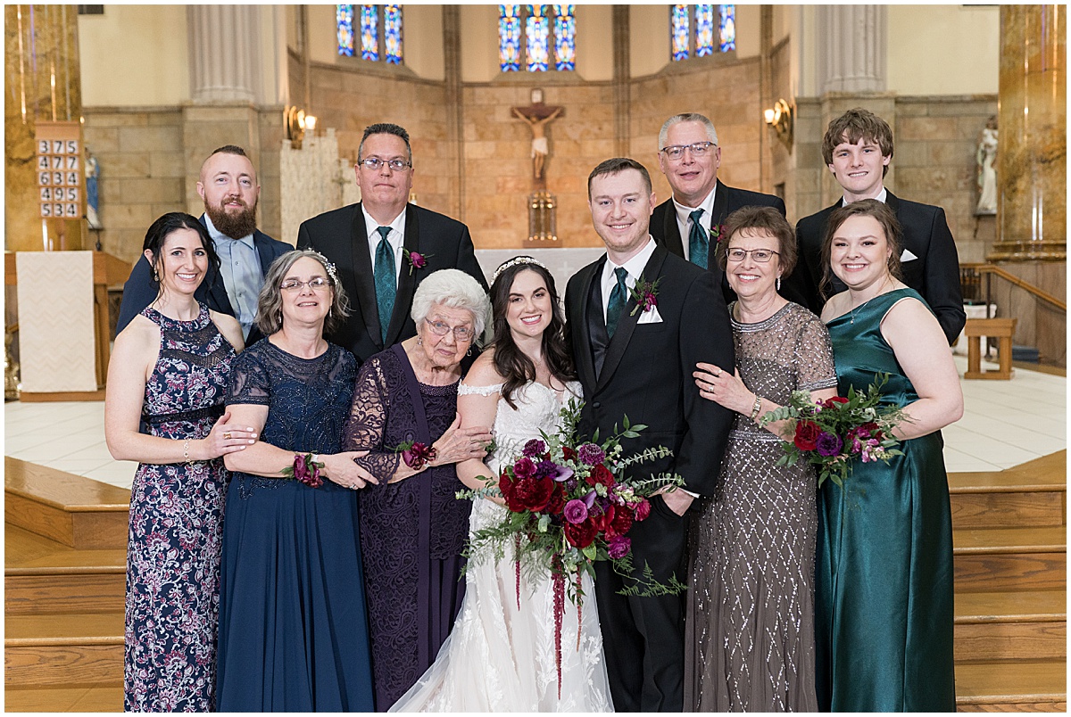 Family photos after Saint Mary's Catholic Cathedral wedding in downtown Indianapolis