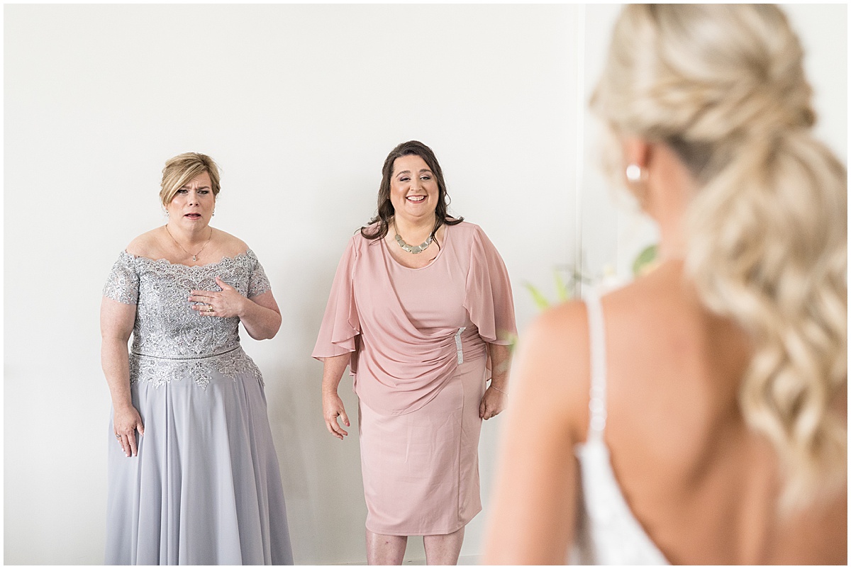 Mothers reaction to bride at wedding at New Journey Farms in Lafayette, Indiana
