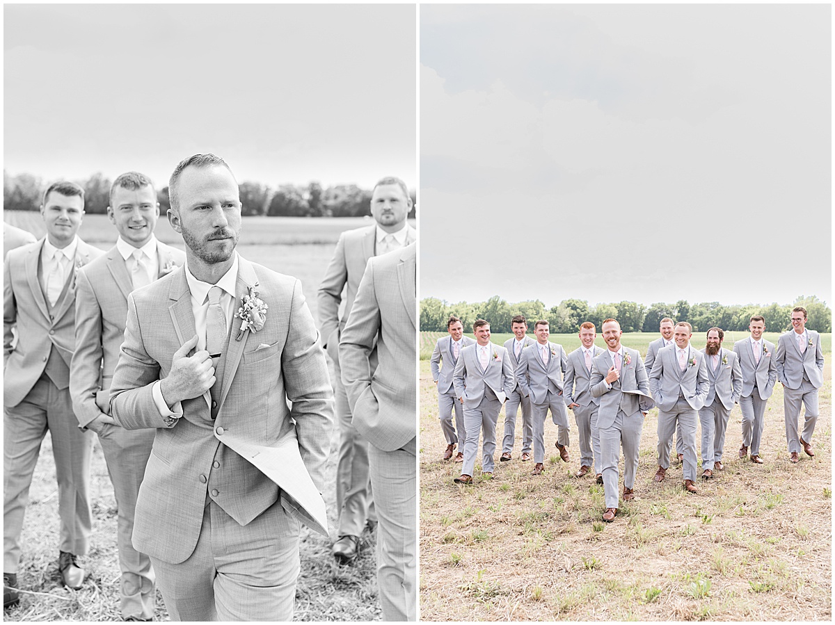 Groom walks with groomsmen before wedding at New Journey Farms in Lafayette, Indiana