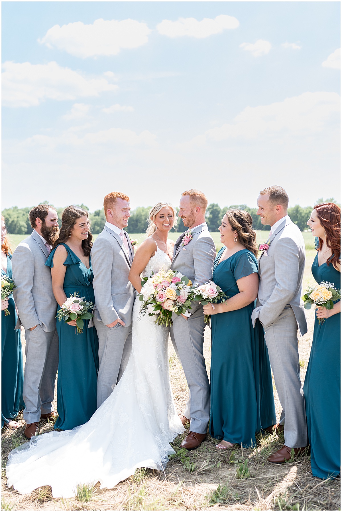 Bridal party laugh together before wedding at New Journey Farms in Lafayette, Indiana