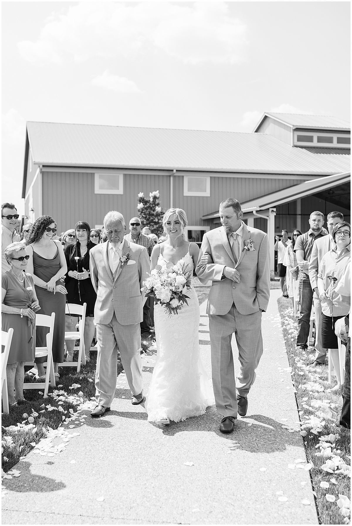 Bride walks down aisle for wedding at New Journey Farms in Lafayette, Indiana