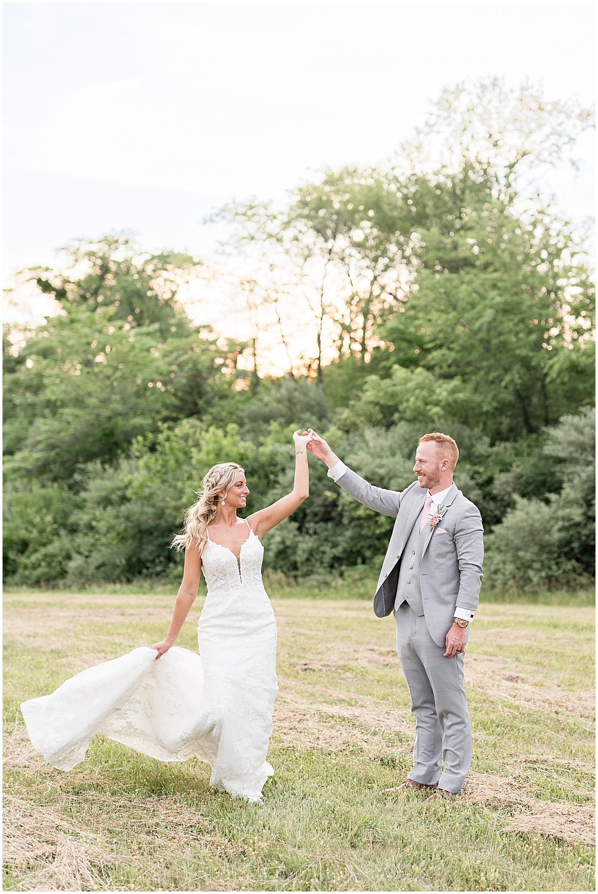 Bride and groom dance in sunset at New Journey Farms in Lafayette, Indiana
