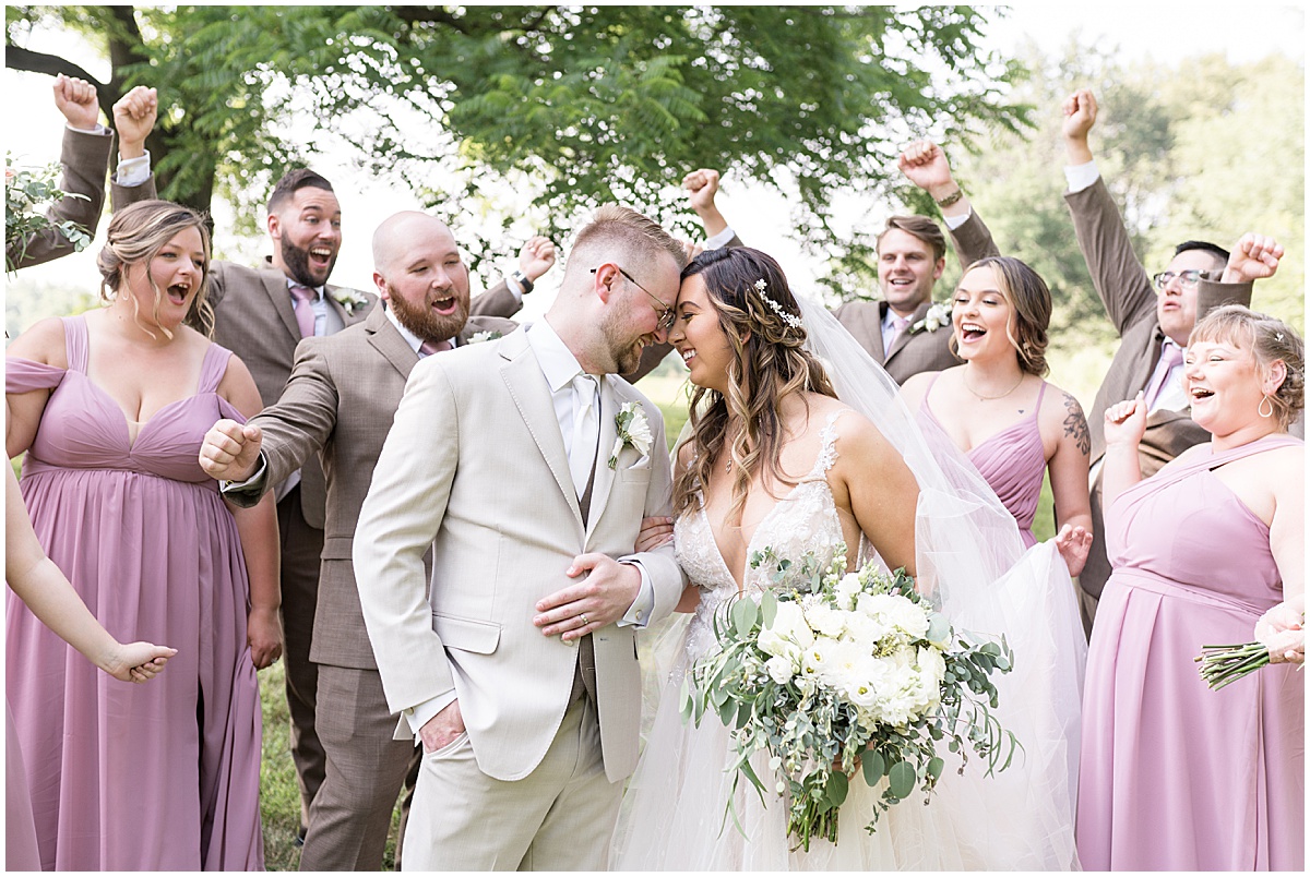 Bridal party celebrates couple at Stables Event Center wedding in Lafayette, Indiana