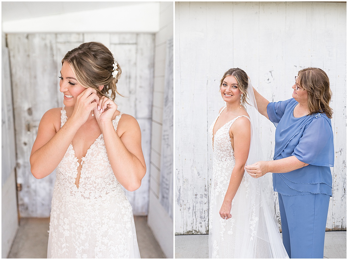 Bride puts on earrings and veil before White Willow Creek Barn wedding in Frankfort, Indiana