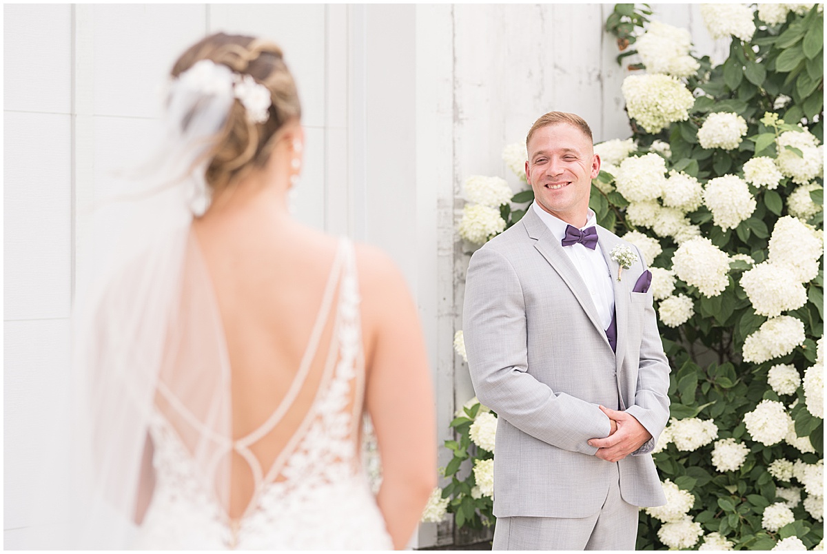 Grooms reaction to bride at White Willow Creek Barn wedding in Frankfort, Indiana