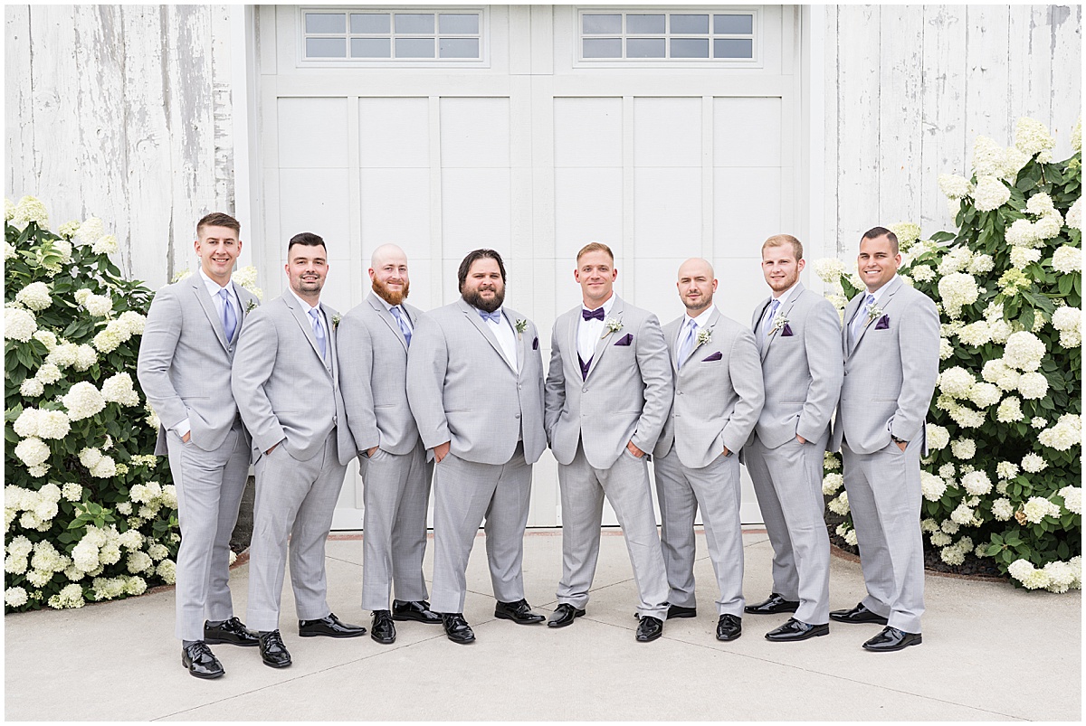 Groom with groomsmen at White Willow Creek Barn wedding in Frankfort, Indiana