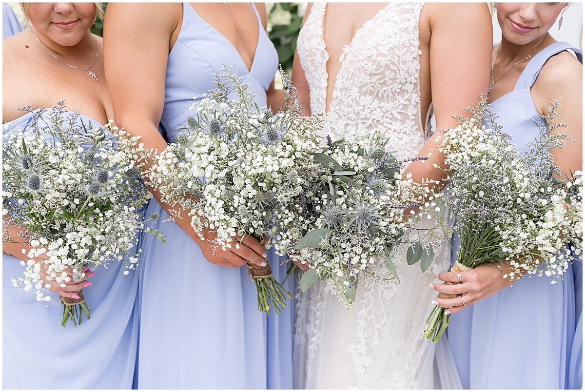 Close up of white and lavender bouquets fro White Willow Creek Barn wedding in Frankfort, Indiana