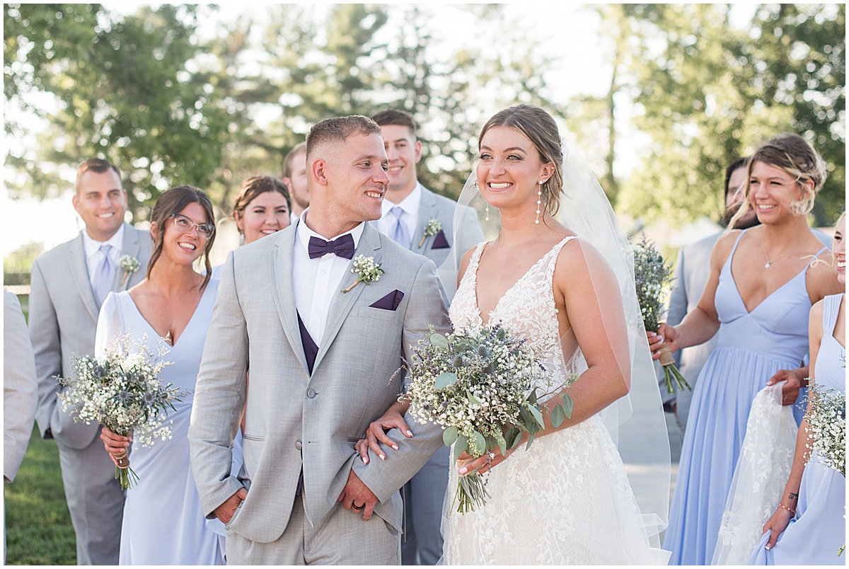 Bridal party walks together at White Willow Creek Barn wedding in Frankfort, Indiana
