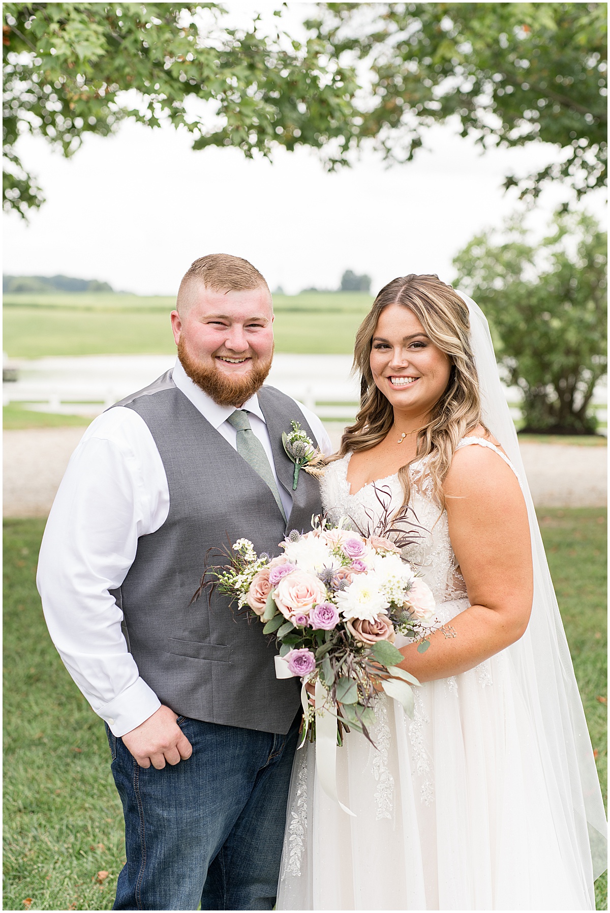 Bride and groom portrait by pond before private property wedding in Peru, Indiana