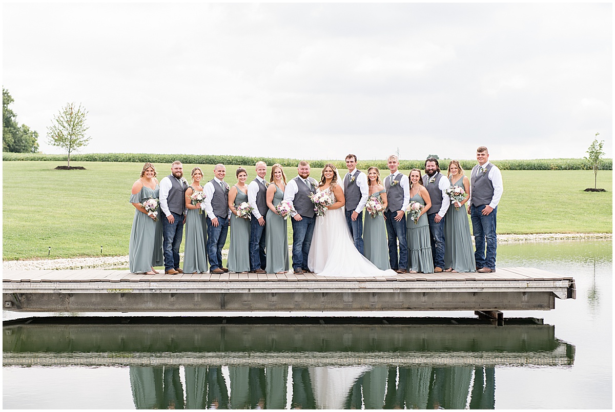 Bridal party on dock before private property wedding in Peru, Indiana
