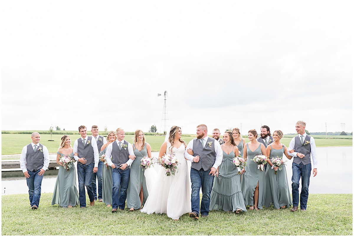 Bridal party portraits by pond at private property wedding in Peru, Indiana
