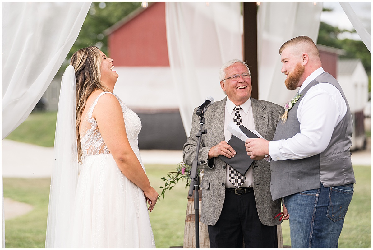 Couple laugh during vows at private property wedding in Peru, Indiana