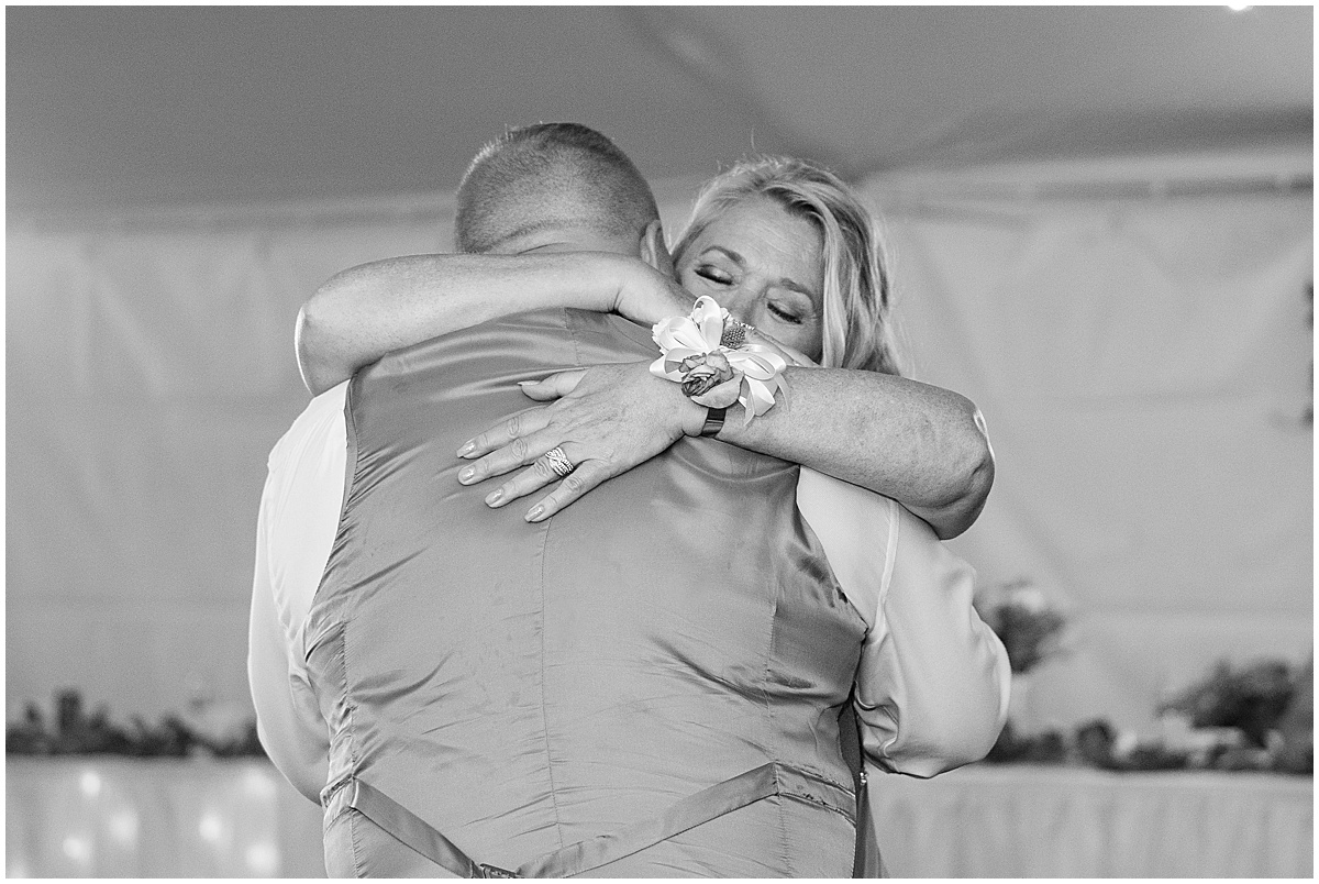 Groom hugs mother at private property wedding in Peru, Indiana