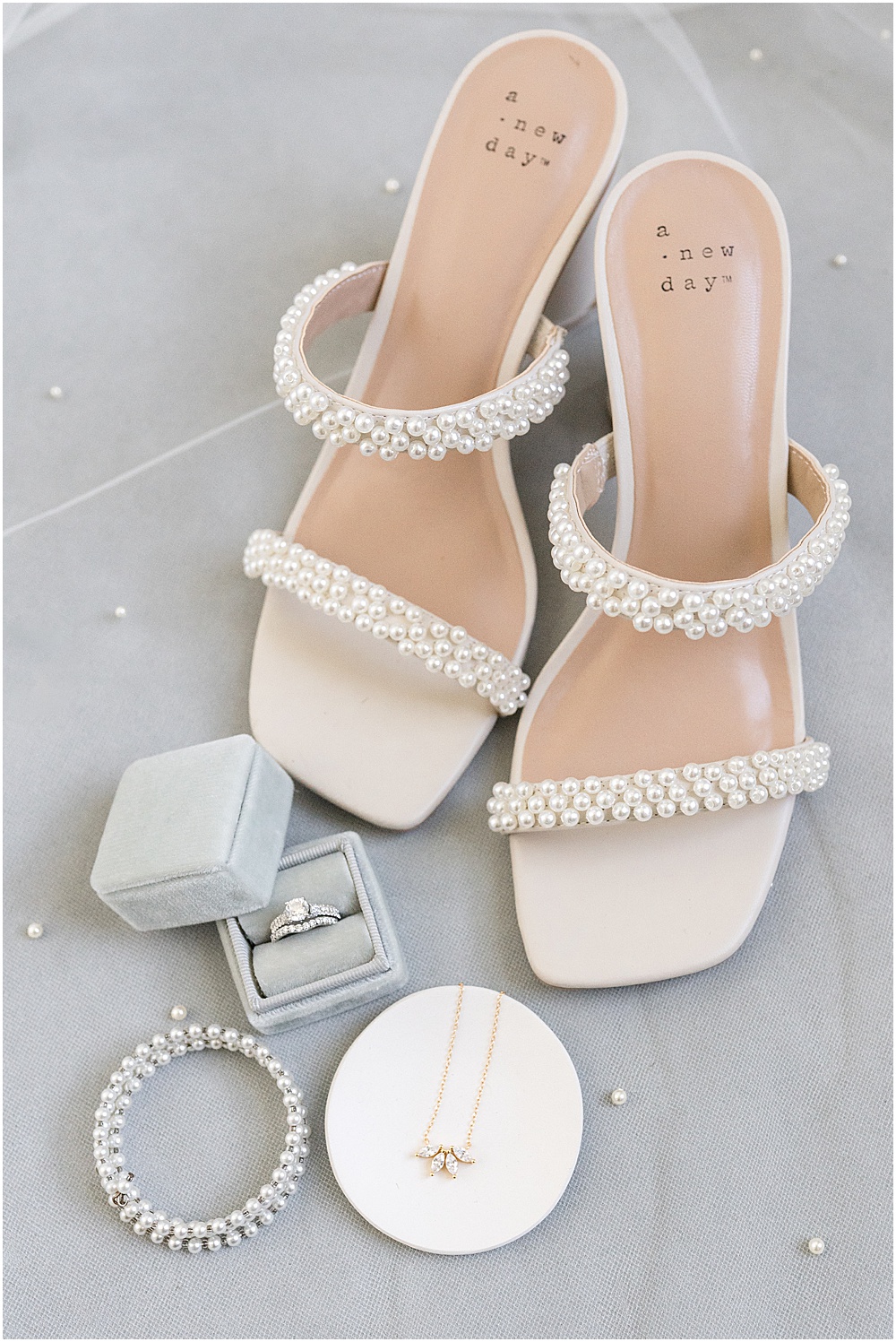Bride's pearl wedding shoes, ring, and jewelry for at-home, brunch wedding in Westfield, Indiana