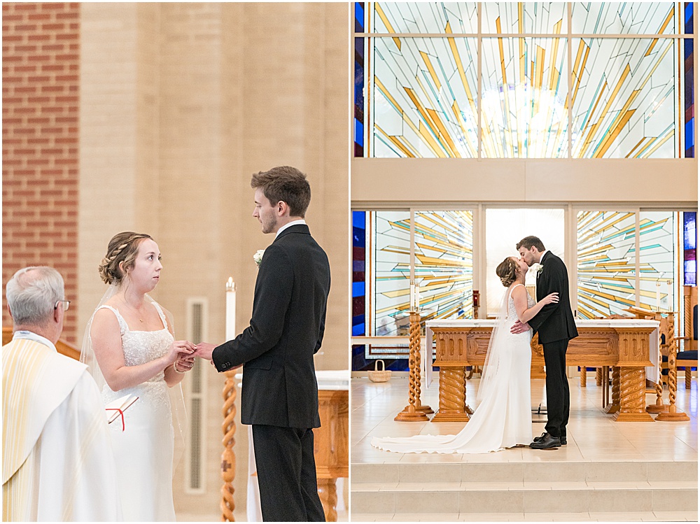 Bride and groom first kiss during St. Maria Goretti Catholic Church wedding ceremony in Westfield, Indiana