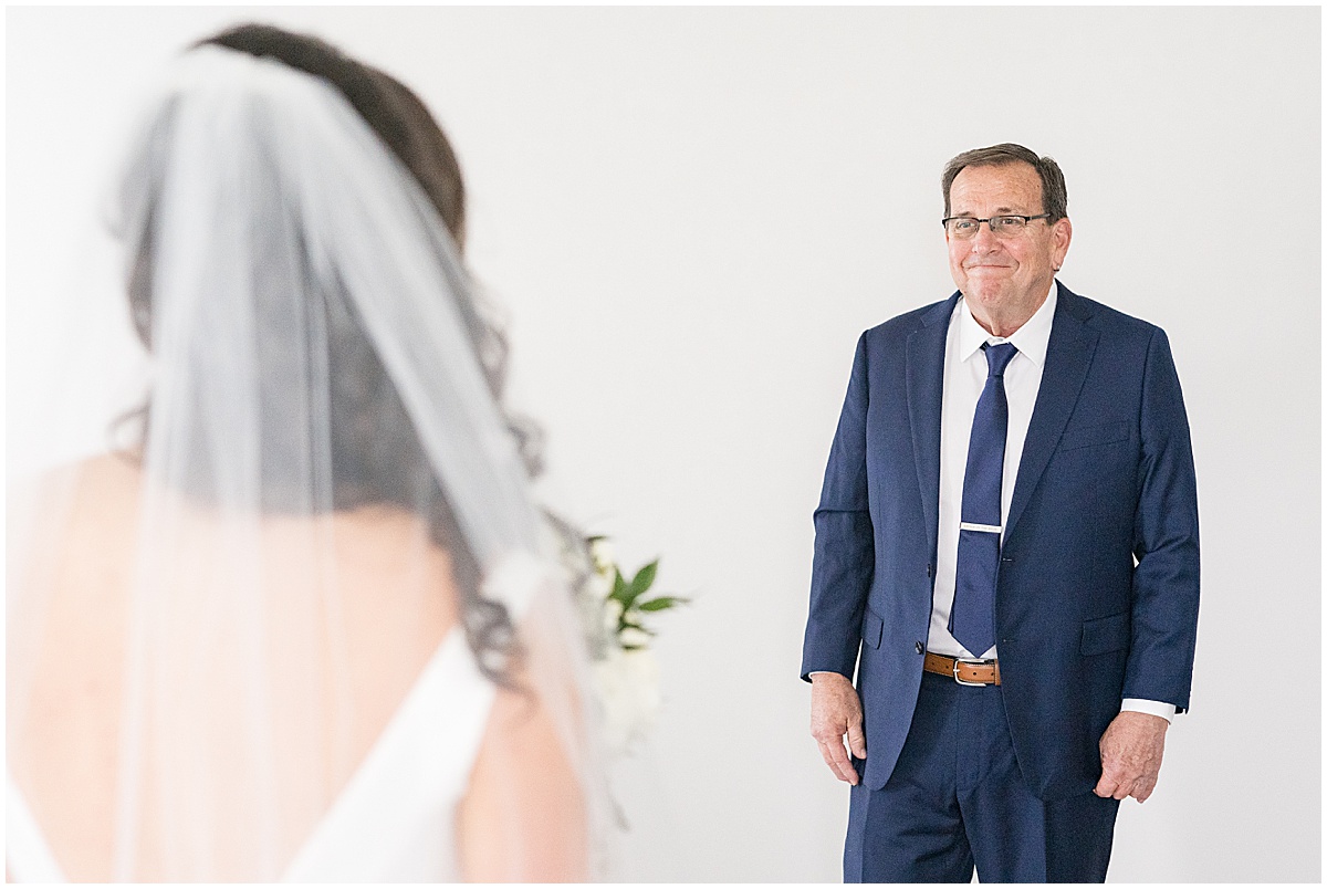 Father of bride reaction to bride at Lighthouse Restaurant wedding in Cedar Lake, Indiana