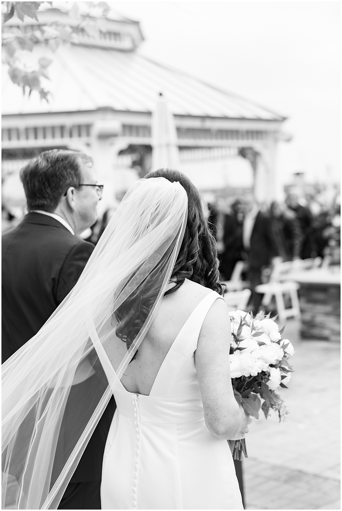 Bride walking down the aisle for Lighthouse Restaurant wedding in Cedar Lake, Indiana