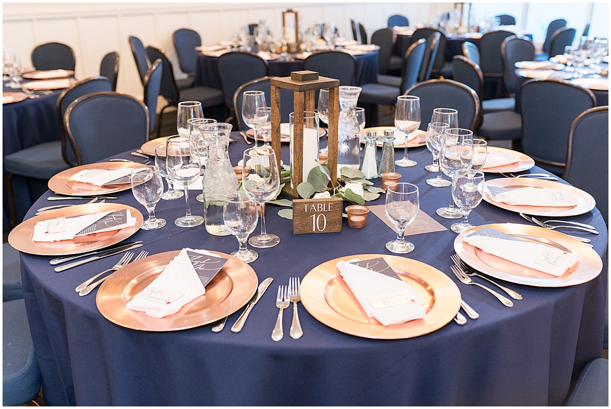 Blue and gold table setting for Lighthouse Restaurant wedding in Cedar Lake, Indiana