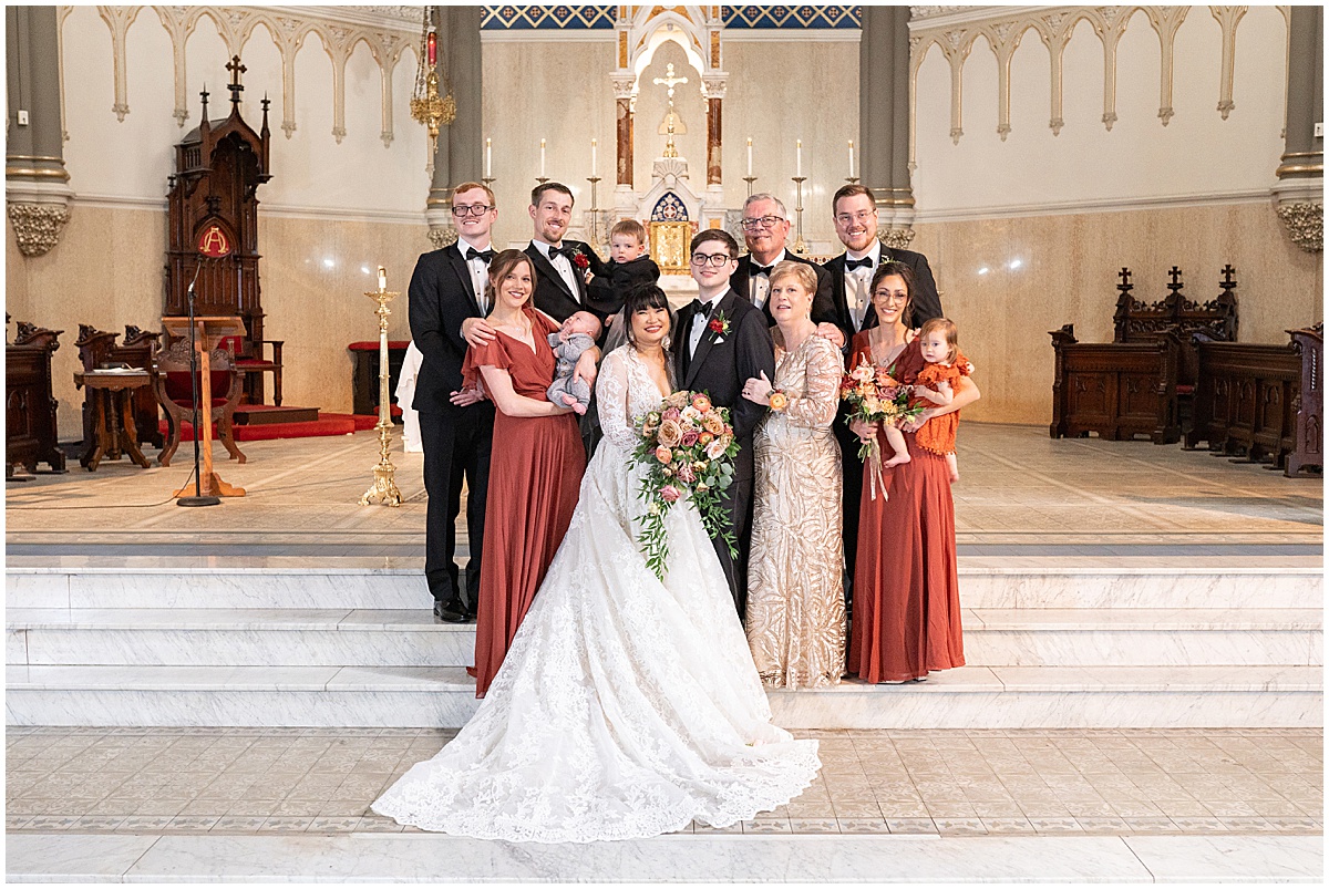 Family photos after wedding at Saint John the Evangelist Church in downtown Indianapolis